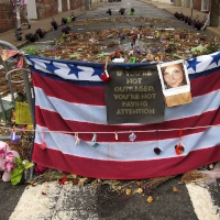 Memorial for Heather Heyer on 4th Street SE in Charlottesville Virginia. Photo credit: Wikimedia Comons user APK (Eigenes Werk), shared under a Creative Commonse By Attribution 4.0 license