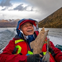 Chief Caleen Sisk holding the Winnemem Wintu salmon baton in New Zealand. Photo: Richard Cosgrove