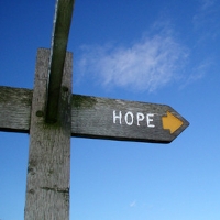 Sign post showing the direction to hope. Photograph by flickr user pol sifter-used under a Creative Commons By Attribution license.