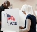 Muslim woman voting. Image courtesy of ISPU