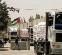 Trucks, (not AFSC affiliated) entering Gaza with humanitarian aid. This image is from TheMuslimIssue, and is used under a Creativ Commons By Attribution license. This image has been cropped for artistic composition. 